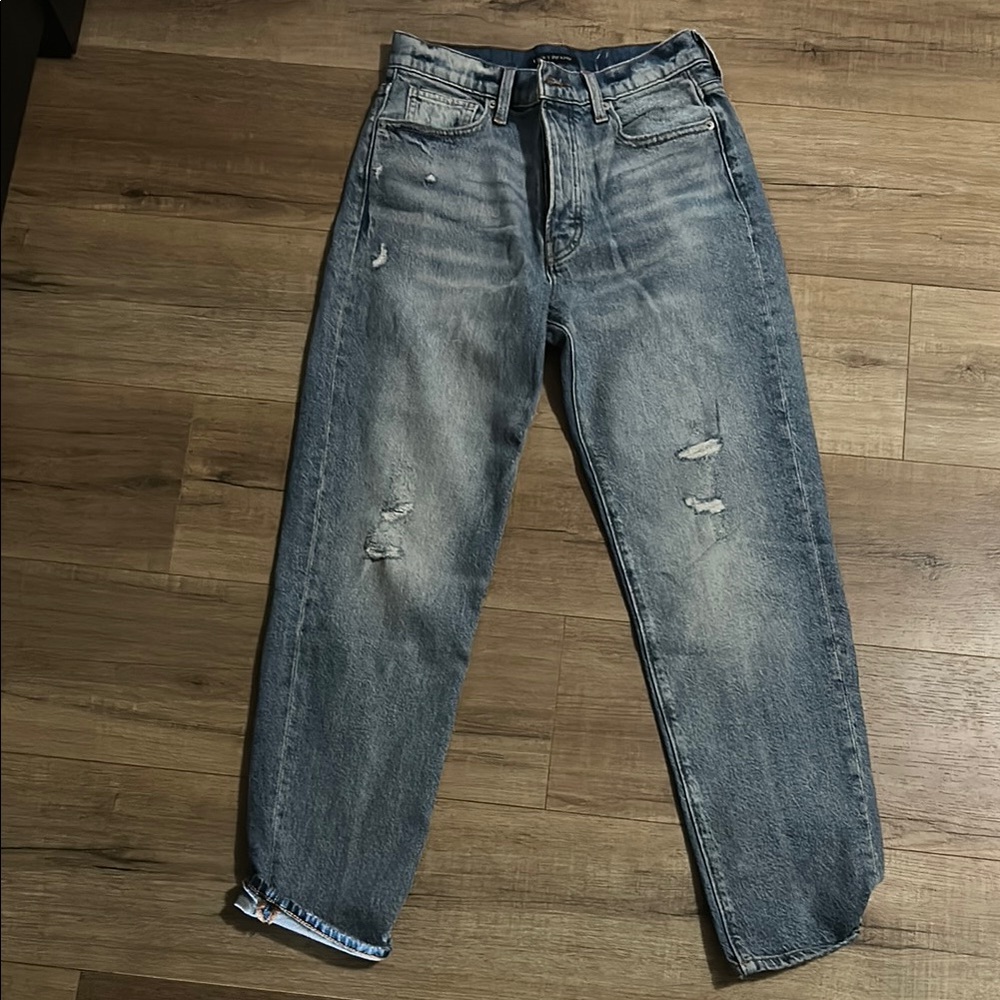 Distressed Blue Jeans